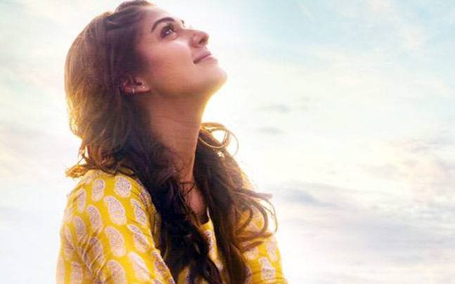 Nayanthara as Leela in Naanum Rowdy Dhaan, showcasing her strong and independent character in Tamil cinema.